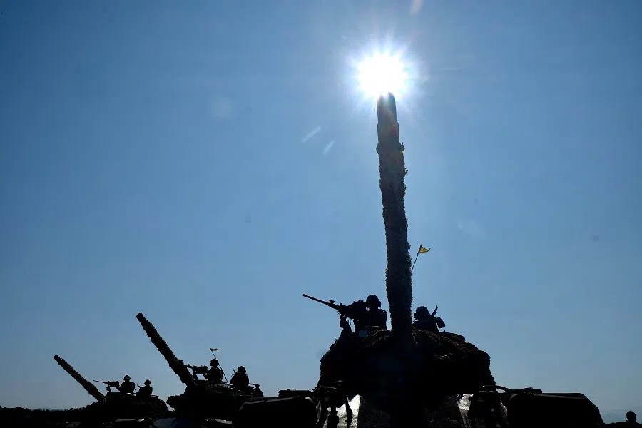 In this file photo taken on 19 January 2021, Taiwan's tank troops line up for photographs after a drill in Hsinchu military base ahead of the Chinese New Year holiday. (Sam Yeh/AFP)