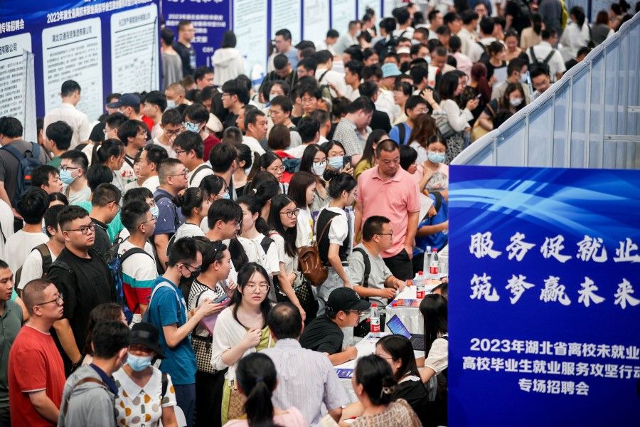 University graduates attend a job fair in Wuhan, in China's central Hubei province, on 10 August 2023. (AFP)