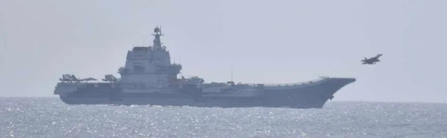 A jet fighter takes off from China's Shandong aircraft carrier, over Pacific Ocean waters, south of Okinawa prefecture, Japan, in this handout released by the Joint Staff Office of Japan's Ministry of Defense, 10 April 2023. (Joint Staff Office of the Defense Ministry of Japan/Handout via Reuters)
