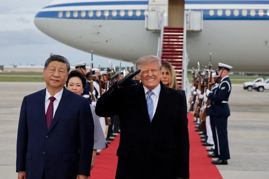 US President Donald Trump salutes next to Chinese President Xi Jinping as he arrives ahead of a state visit at Joint Base Andrews, Maryland, US, 23 September 2026.