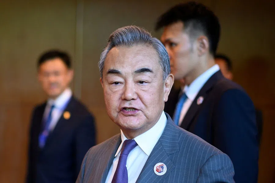 China’s Foreign Minister Wang Yi speaks to the media as he walks between meetings during the 58th ASEAN Foreign Ministers’ meeting and related meetings at the Convention Centre in Kuala Lumpur on 11 July 2025. (Mandel Ngan/Pool via Reuters)