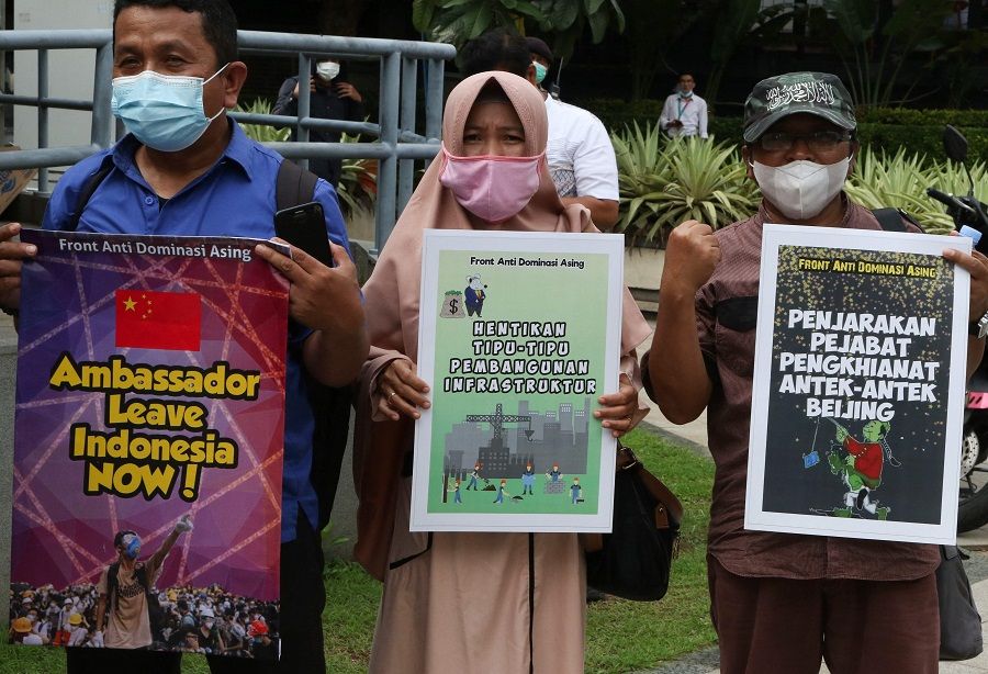 People protest against China's claims on the disputed South China Sea, outside the Chinese Embassy in Jakarta, Indonesia, on 8 December 2021. (Dasril Roszandi/AFP)
