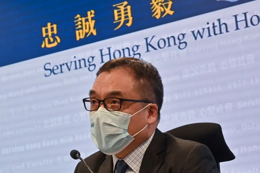 Hong Kong's senior superintendent of the National Security Department Steve Li Kwai-wah speaks to the media at the Wanchai police headquarters in Hong Kong on 29 December 2021, after police raided the office of online pro-democracy media outlet Stand News and arrested six people earlier in the day. (Peter Parks/AFP)
