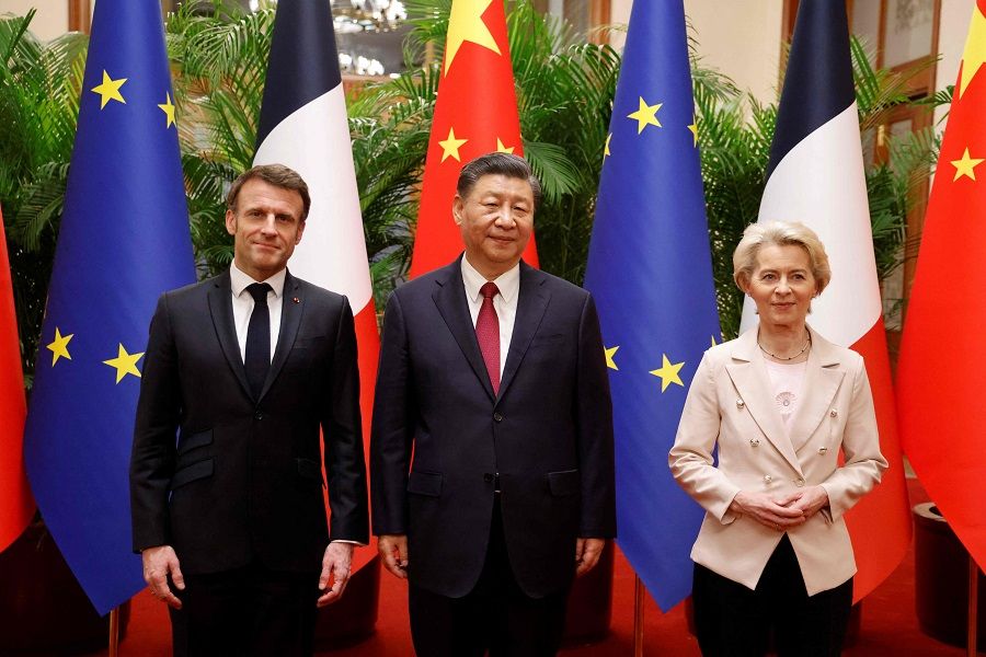 Chinese President Xi Jinping (centre), his French counterpart Emmanuel Macron (left) and European Commission President Ursula von der Leyen meet for a working session in Beijing, China, on 6 April 2023. (Ludovic Marin/Pool/AFP)