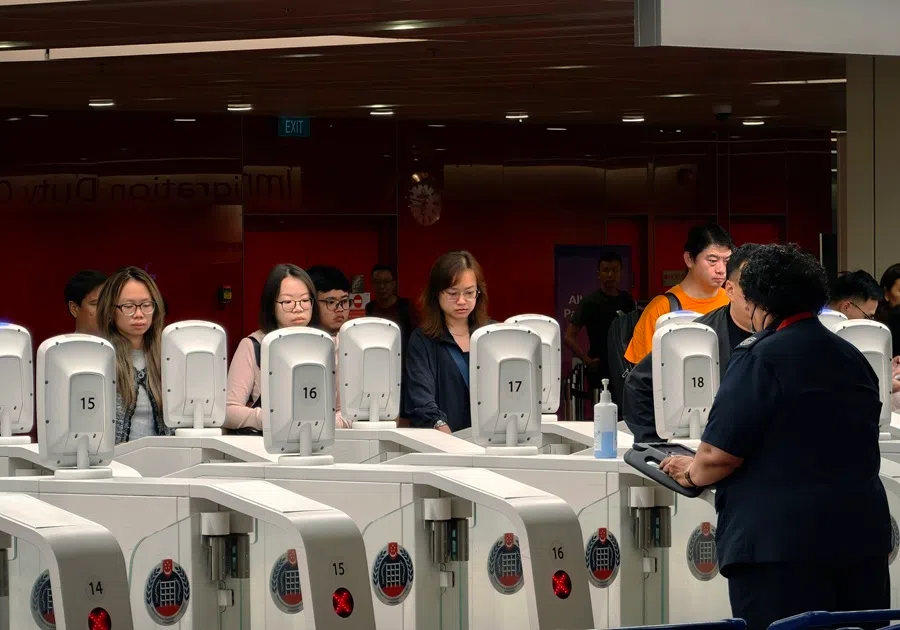 Travellers using the automated immigration lanes at Changi Airport Terminal 1, Singapore, on 30 May 2026.