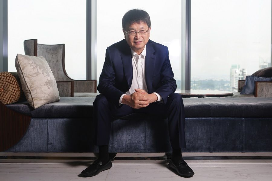 Yangzijiang Financial Holding (YZJFH) executive chairman Ren Yuanlin. (SPH Media)