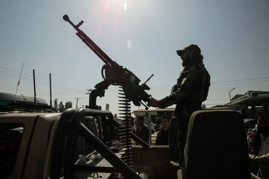  A Taliban security personnel rides an armed vehicle on the outskirts of Jalalabad on 28 February 2026, amid the ongoing clashes between Pakistan and Afghanistan.