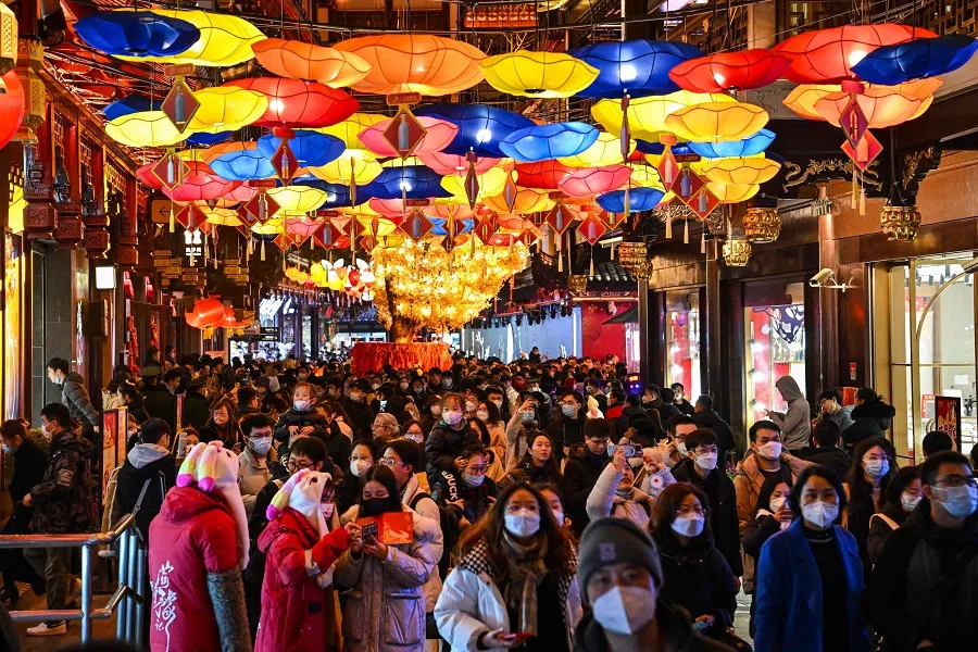 People visit the Yu Garden in Shanghai, China, on 5 February 2023. (Hector Retamal/AFP)