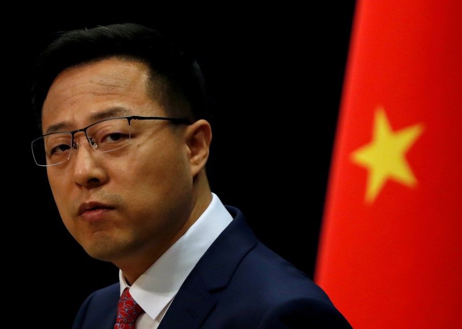 Chinese Foreign Ministry spokesman Zhao Lijian attends a news conference in Beijing, 8 April 2020. Zhao reiterated the Foreign Ministry's stand at a regular press briefing on 20 May 2020. (Carlos Garcia Rawlins/REUTERS)