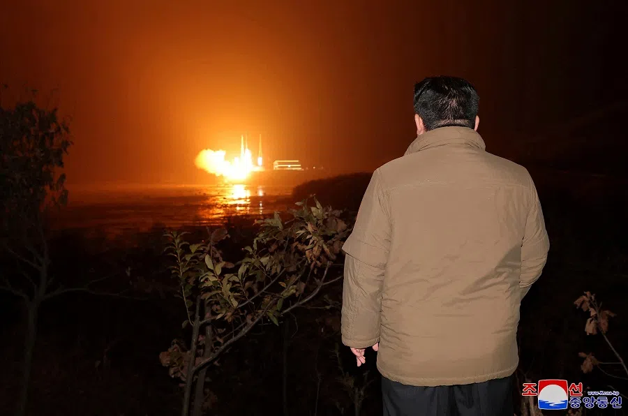 North Korean leader Kim Jong-un looks on as a rocket carrying a spy satellite Malligyong-1 is launched, as North Korean government claims, in a location given as North Gyeongsang province, North Korea in this handout picture obtained by Reuters on 21 November 2023. (KCNA via Reuters)