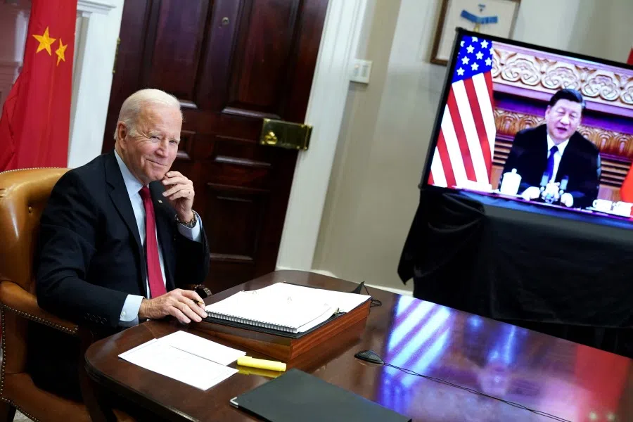 US President Joe Biden meets with China's President Xi Jinping during a virtual summit from the Roosevelt Room of the White House in Washington, DC, 15 November 2021. (Mandel Ngan/AFP)
