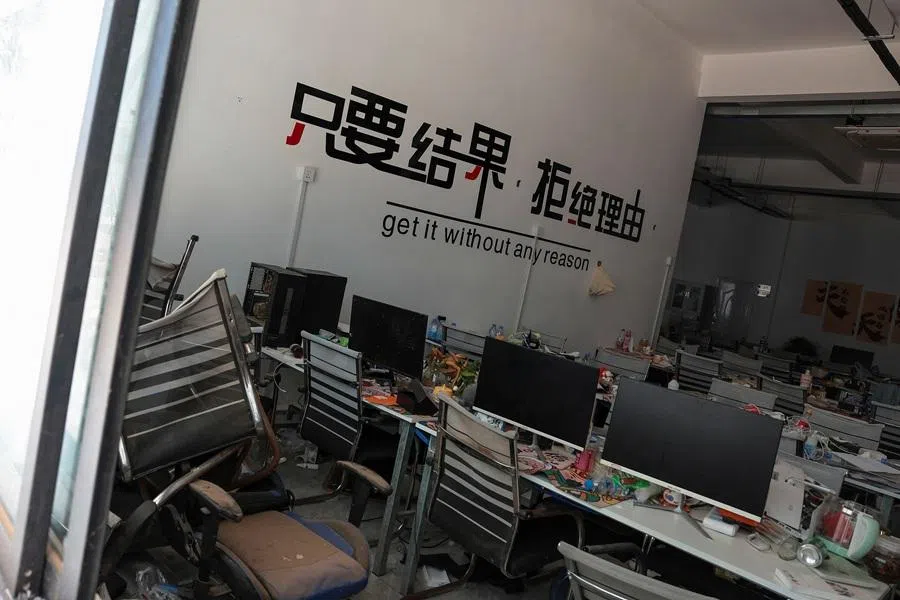 Workstations inside a compound in O’Smach used for scam operations, at the Chong Chom-O’Smach border crossing, which was bombed and occupied by the Thai military in December following clashes between Thailand and Cambodia along a disputed border area, in Samraong, Oddar Meanchey province, Cambodia, 7 April 2026. (Chalinee Thirasupa/Reuters)