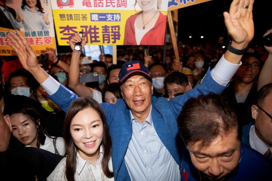 The founder of tech giant Foxconn, Terry Gou (centre), attends a campaign rally in Kaohsiung on 7 May 2023. (Jameson Wu/AFP)