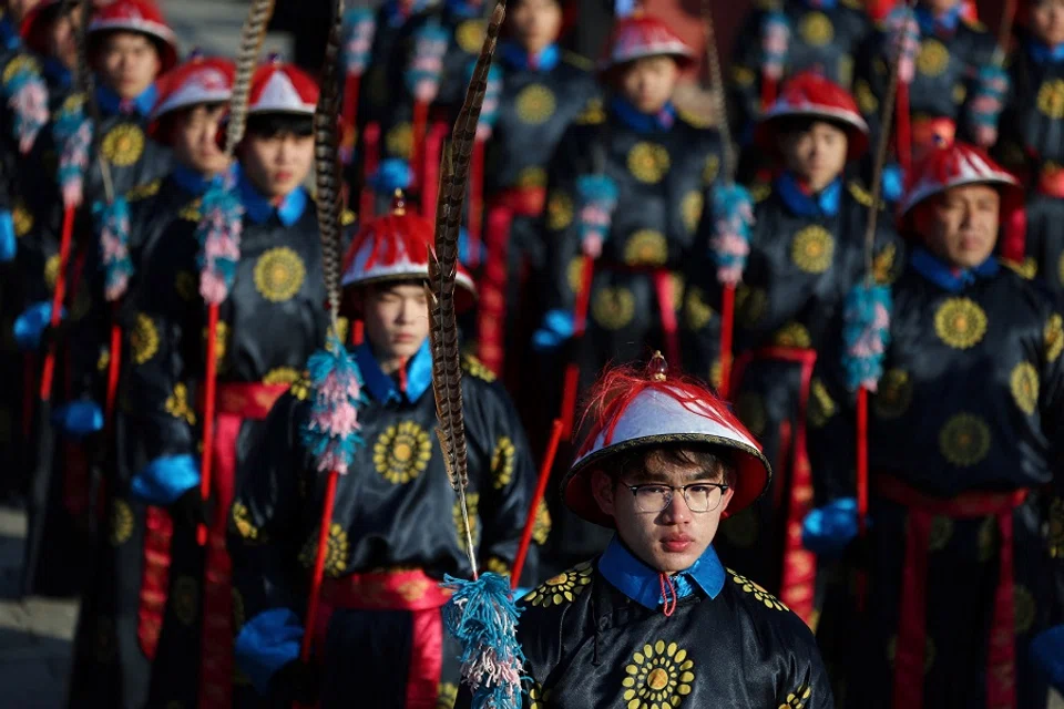 2025年1月29日，农历大年初一，北京地坛，演员们重现清朝皇家庆典仪式。（Florence Lo/路透社）