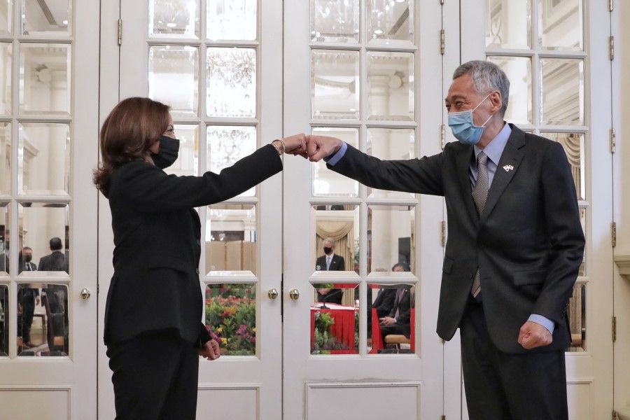 US Vice-President Kamala Harris and PM Lee Hsien Loong share a fist bump before the start of their meeting at the Istana on 23 August 2021. (SPH Media)
