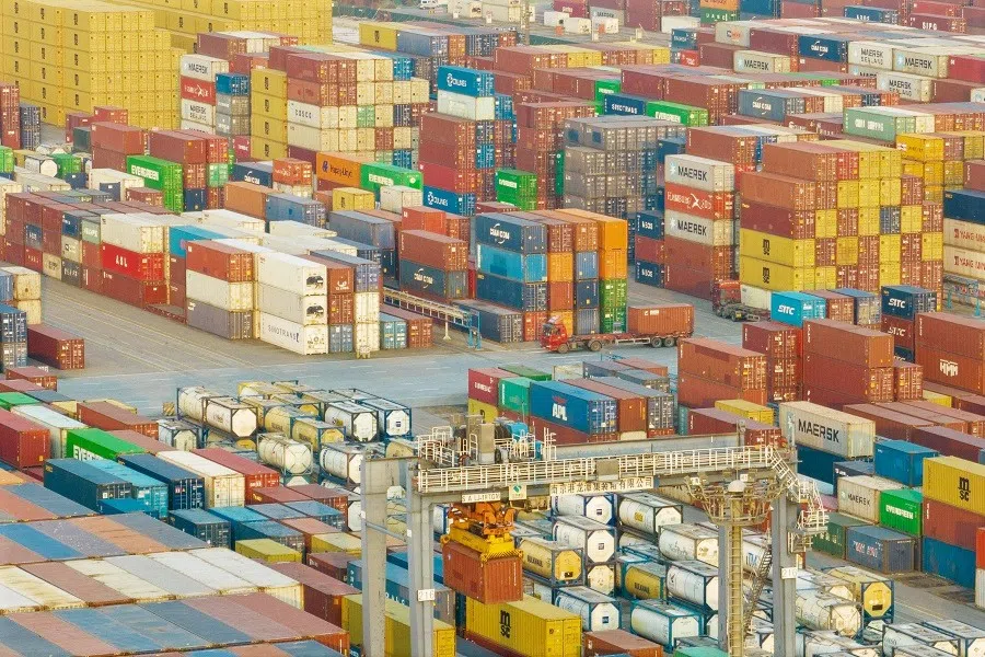 This file photo taken on 3 January 2023 shows shipping containers stacked at Nanjing port, Jiangsu province, China. (AFP)