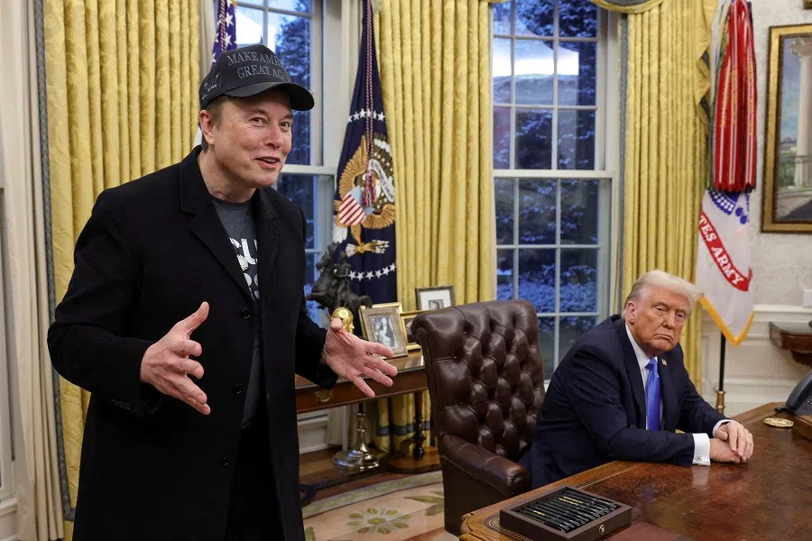 Elon Musk speaks next to US President Donald Trump in the Oval Office of the White House in Washington, DC, US, on 11 February 2025.