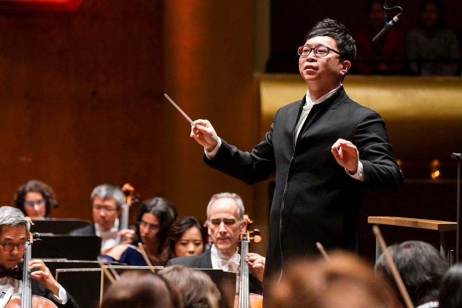 Singaporean conductor Wong Kah Chun conducting the New York Philharmonic during a Chinese New Year concert held at the David Geffen Hall in New York, US, on 6 February 2019. (Photo: Chris Lee)