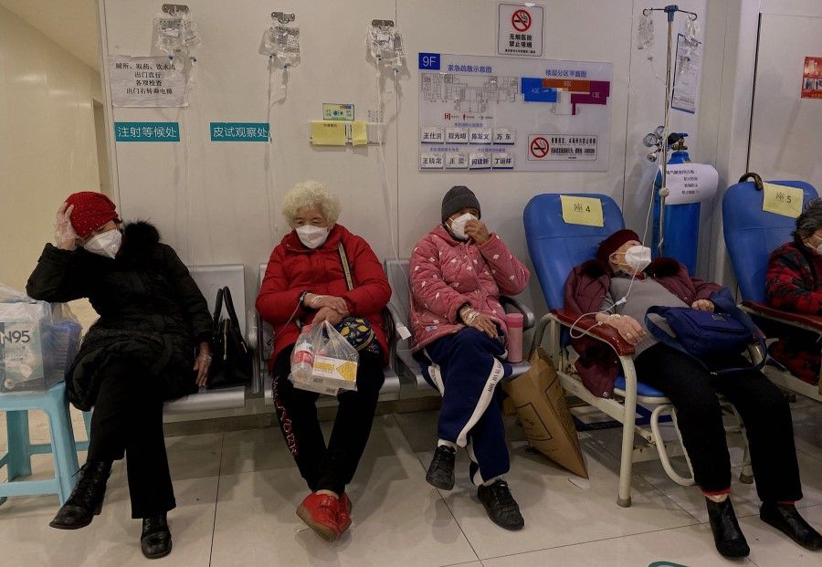 Patients rest in the Second Affiliated Hospital of Chongqing Medical University in China's southwestern city of Chongqing on 23 December 2022. (Noel Celis/AFP)