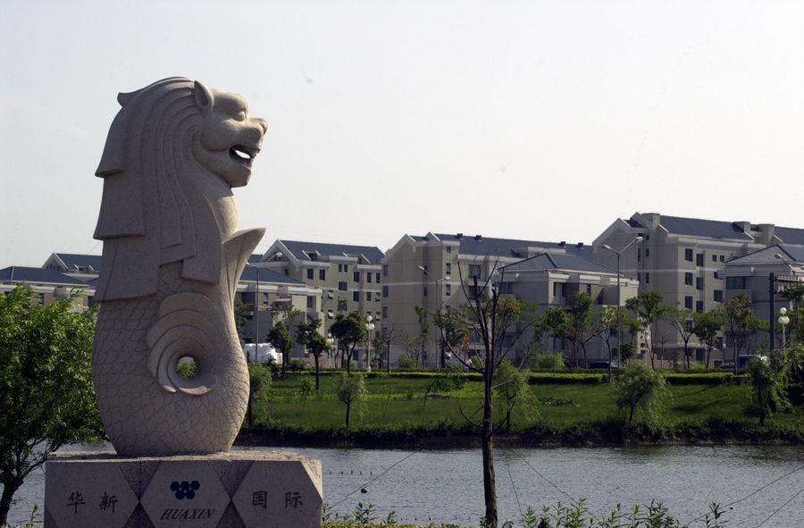 The Chinese officials' experiences help shape the Chinese public's perception of Singapore. The photo shows a mini Merlion overlooking residential blocks in Suzhou. (SPH)