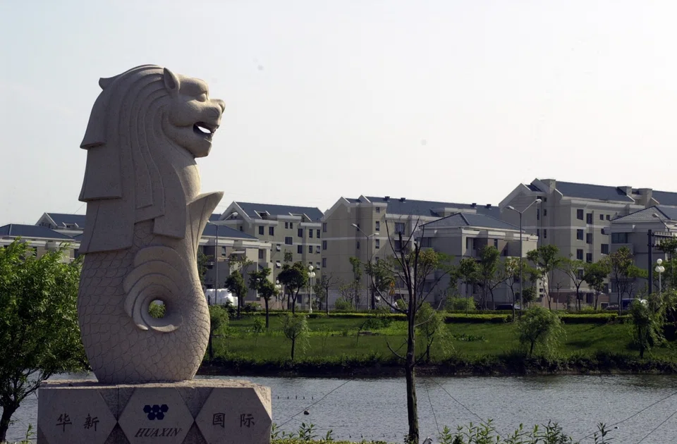 The Chinese officials' experiences help shape the Chinese public's perception of Singapore. The photo shows a mini Merlion overlooking residential blocks in Suzhou. (SPH)