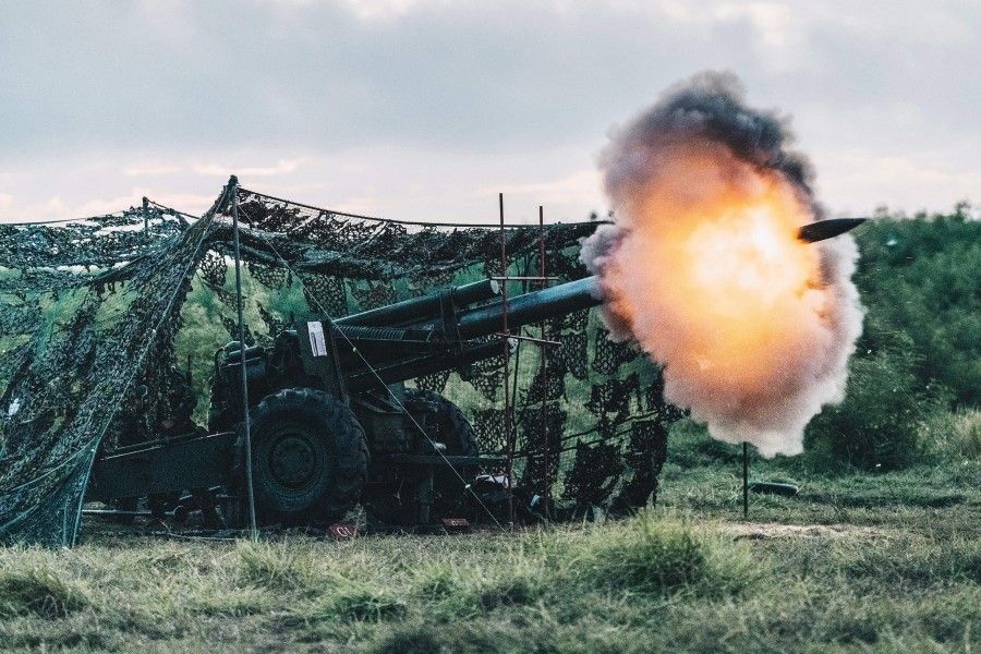 This file handout photo, courtesy of Taiwan's Ministry of National Defense taken on 24 August 2022 shows a US-made 155mm howitzer firing during a drill at Penghu islands. (Handout/Taiwan's Ministry of National Defense/AFP)