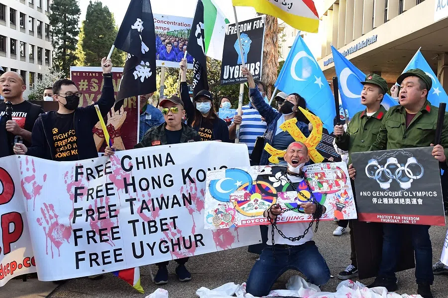Activists protest against the 2022 Beijing Winter Olympics outside the Consulate of China in Los Angeles, California on 3 February 2022. (Frederic J. Brown/AFP)
