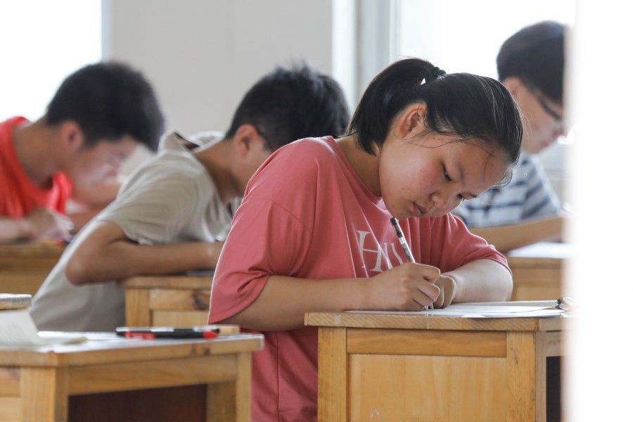 Students take an exam during the first day of the gaokao, in Baofeng county, Pingdingshan city, in China's central Henan province, 7 July 2020. (STR/AFP)