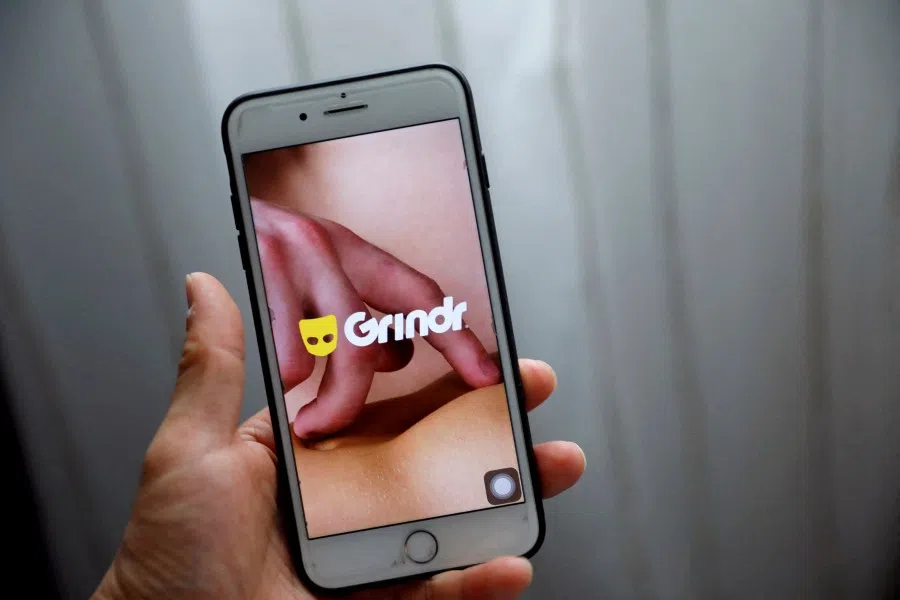 The Grindr app is seen on a mobile phone in this photo illustration taken in Shanghai, China, 28 March 2019. (Aly Song/Reuters)