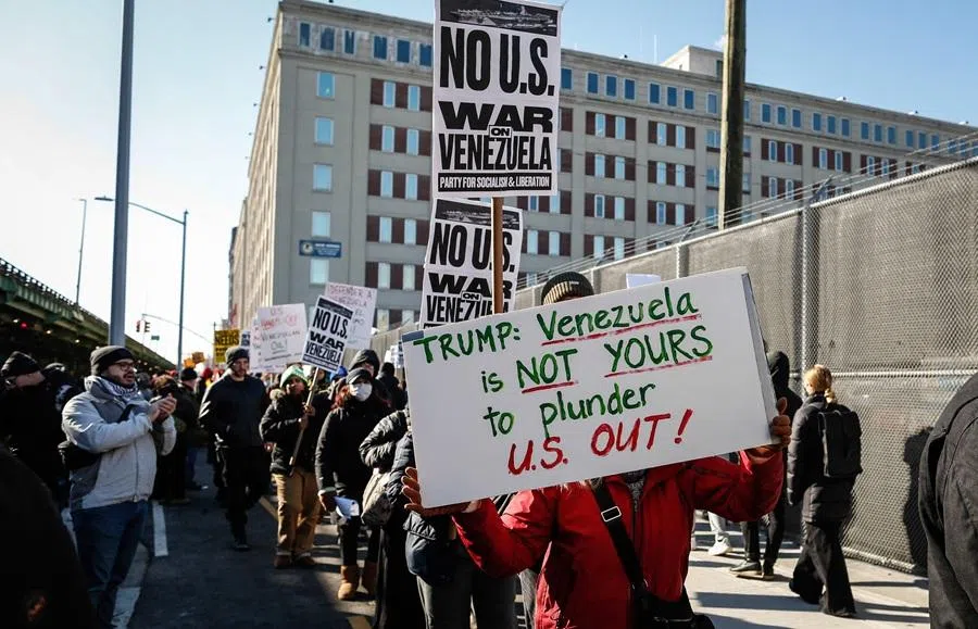 People take part in a demonstration against US military action in Venezuela outside the Metropolitan Detention Center, where ousted Venezuelan President Nicolas Maduro is being held, in the Brooklyn borough of New York City, on 4 January 2026. (Kena Betancur/AFP)