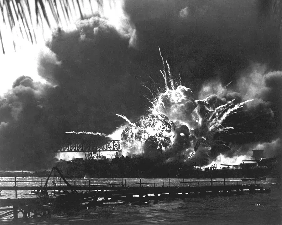 The USS SHAW explodes during the Japanese raid on Pearl Harbor on 7 December 1941 in this historic US Navy photograph. (US Navy/Handout/Reuters)