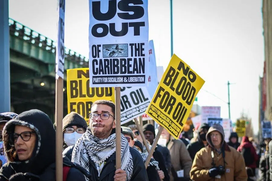 People take part in a demonstration against US military action in Venezuela outside the Metropolitan Detention Center, where ousted Venezuelan President Nicolas Maduro is being held, in the Brooklyn borough of New York City, on 4 January 2026. (Kena Betancur/AFP)
