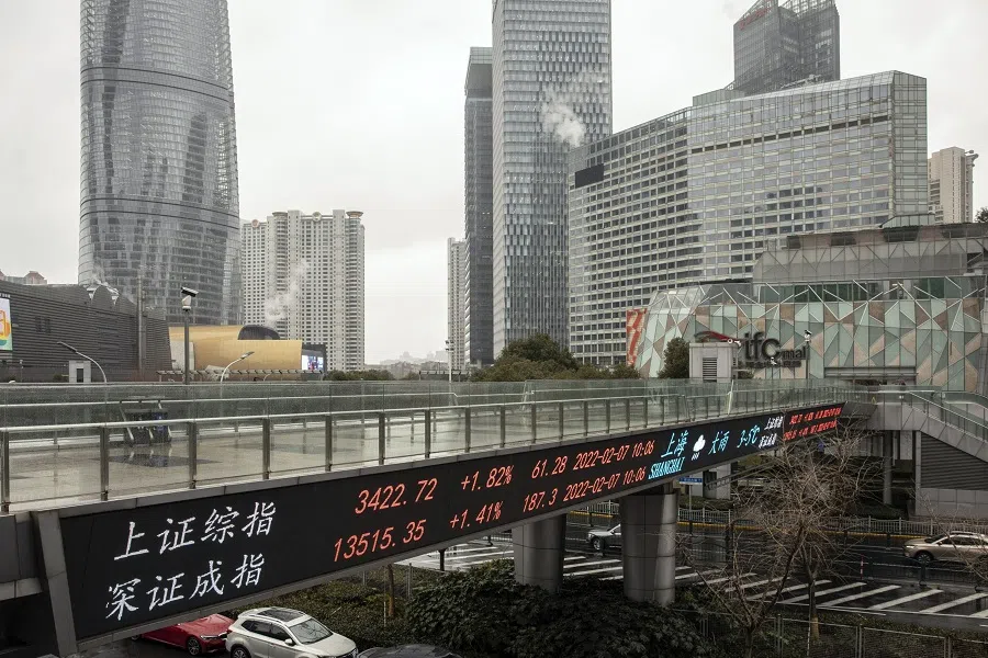 An electronic ticker displays stock figures in Pudong's Lujiazui financial district in Shanghai, China, on 7 February 2022. (Qilai Shen/Bloomberg)