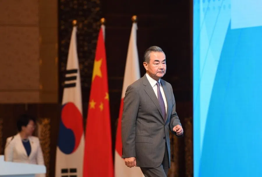 Wang Yi at the International Forum for Trilateral Cooperation in Qingdao, 3 July 2023. (Chinese Foreign Ministry website)