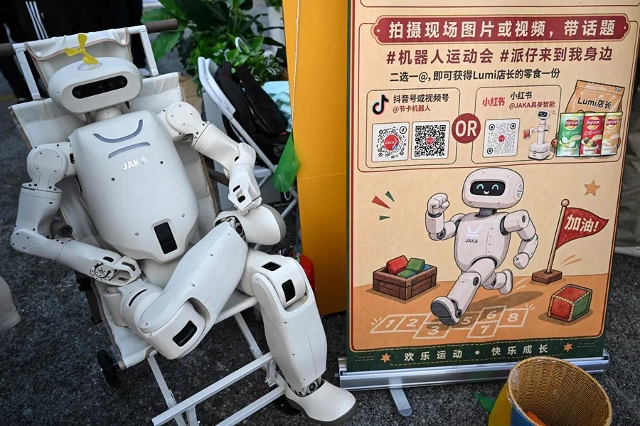 A robot is seen at a food booth during the 2nd World Humanoid Robot Games in Beijing on 22 August 2026.