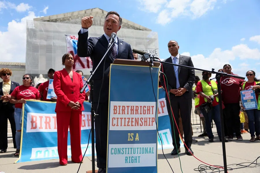 William Tong, attorney general of Connecticut, speaks to the media, on the day Supreme Court justices listened oral arguments over US President Donald Trump's bid to broadly enforce his executive order to restrict automatic birthright citizenship, outside the US Supreme Court in Washington, DC, US, on 15 May 2025. (Leah Millis/Reuters)
