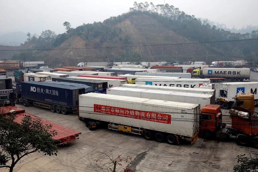 Container trucks are seen while waiting to cross the border at Huu Nghi border gate connecting with China, in Lang Son province, Vietnam, on 20 February 2020. (Kham/Reuters)