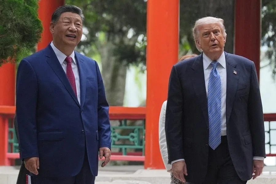 President Donald Trump talks with China’s President Xi Jinping at the Zhongnanhai leadership compound, on 15 May 2026, in Beijing.