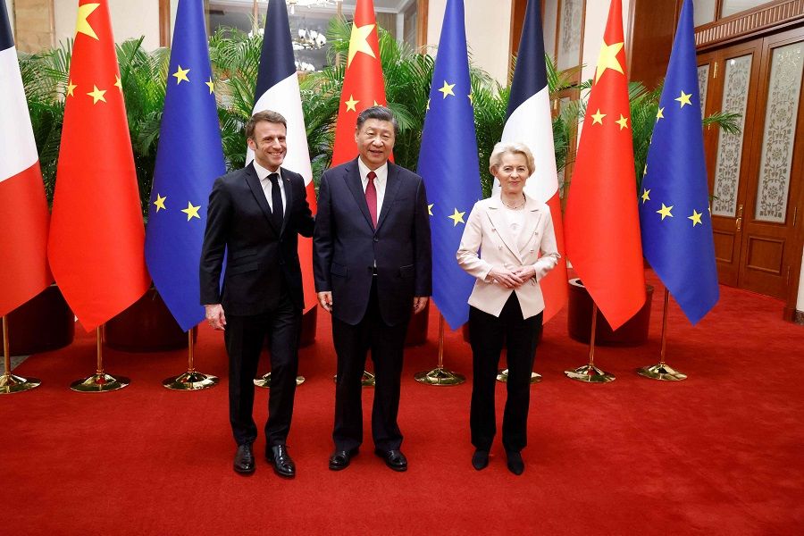 Chinese President Xi Jinping (centre), his French counterpart Emmanuel Macron (left) and European Commission President Ursula von de Leyen meet for a working session in Beijing, China, on 6 April 2023. (Ludovic Marin/Pool/AFP)