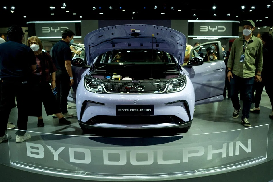 Visitors view a BYD Dolphin EV at the 44th Bangkok International Motor Show in Bangkok, Thailand, 23 March 2023. (Athit Perawongmetha/File Photo/Reuters)