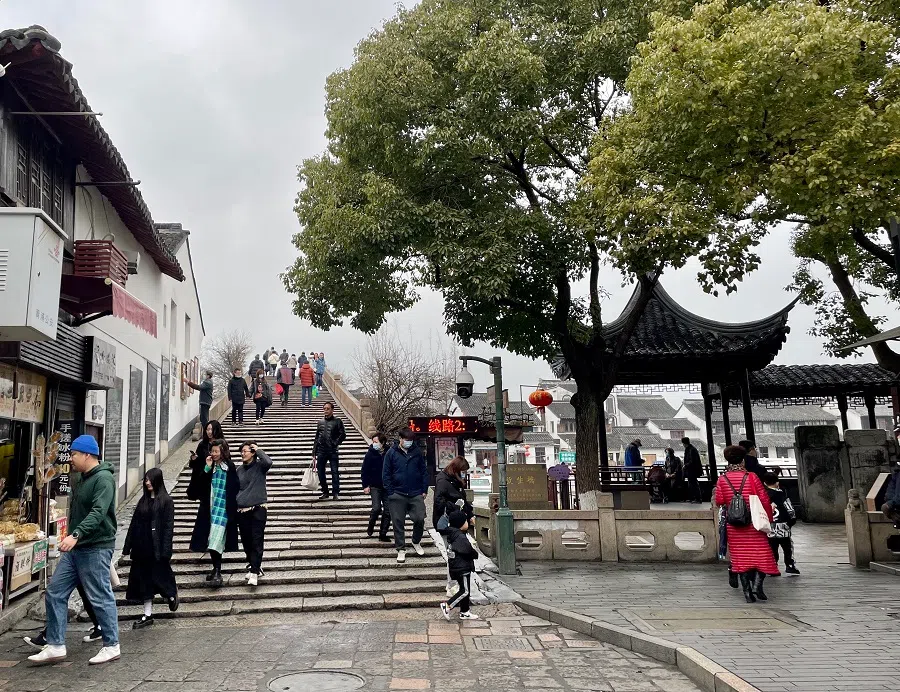 People walk in the water town of Zhujiajiao in the Qingpu district of Shanghai, China. (SPH Media)
