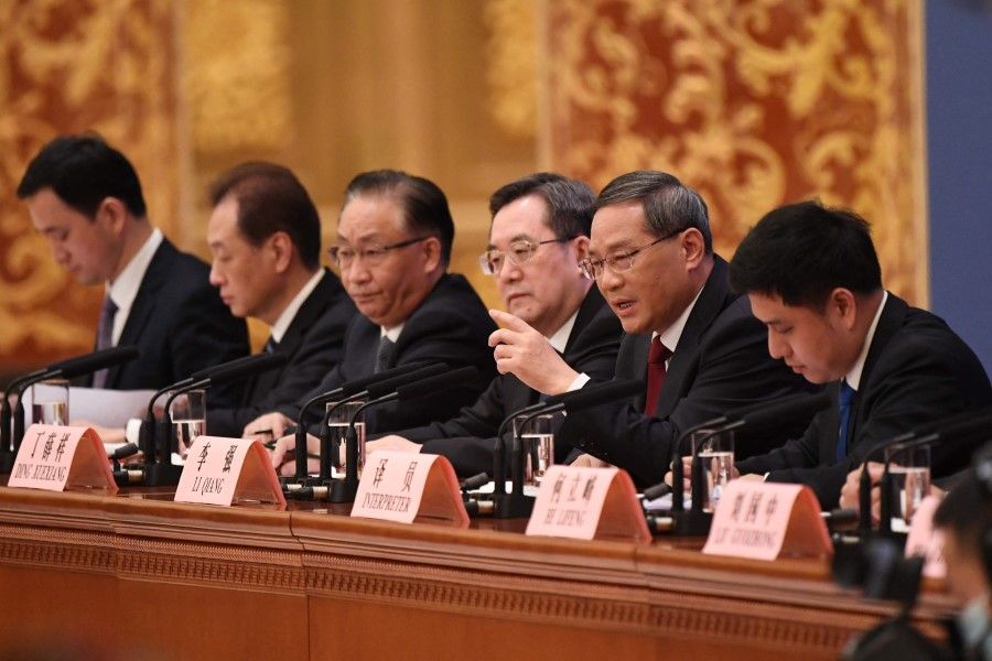 China's Premier Li Qiang (second from right) speaks during a press conference after the closing session of the National People's Congress at the Great Hall of the People in Beijing on 13 March 2023. (Greg Baker/AFP)