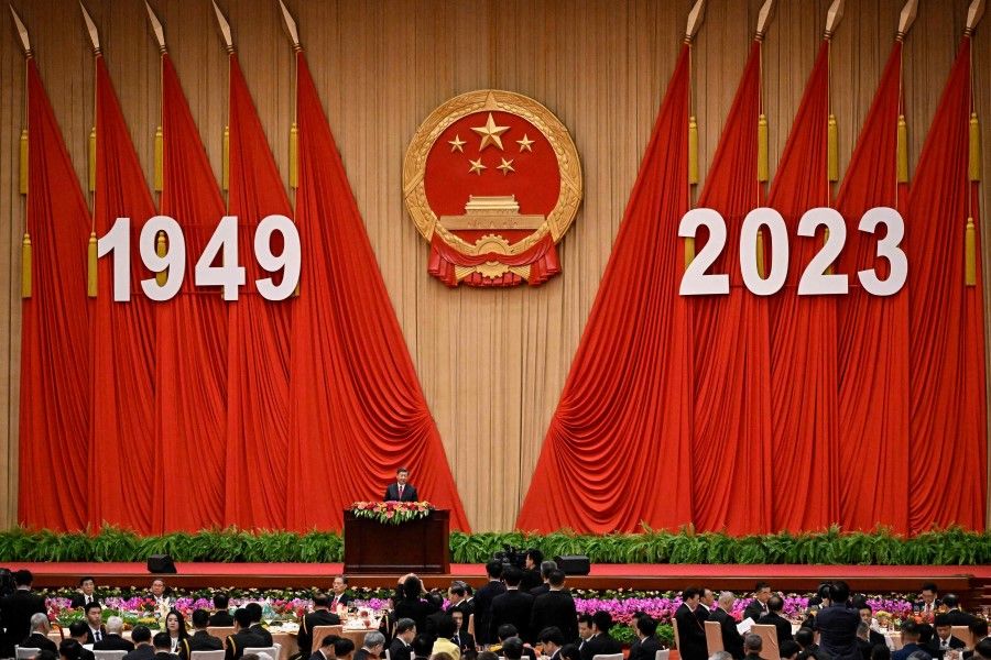 Chinese President Xi Jinping delivers a speech during a reception dinner at the Great Hall of the People ahead of China's National Day in Beijing on 28 September 2023. (Jade Gao/AFP)