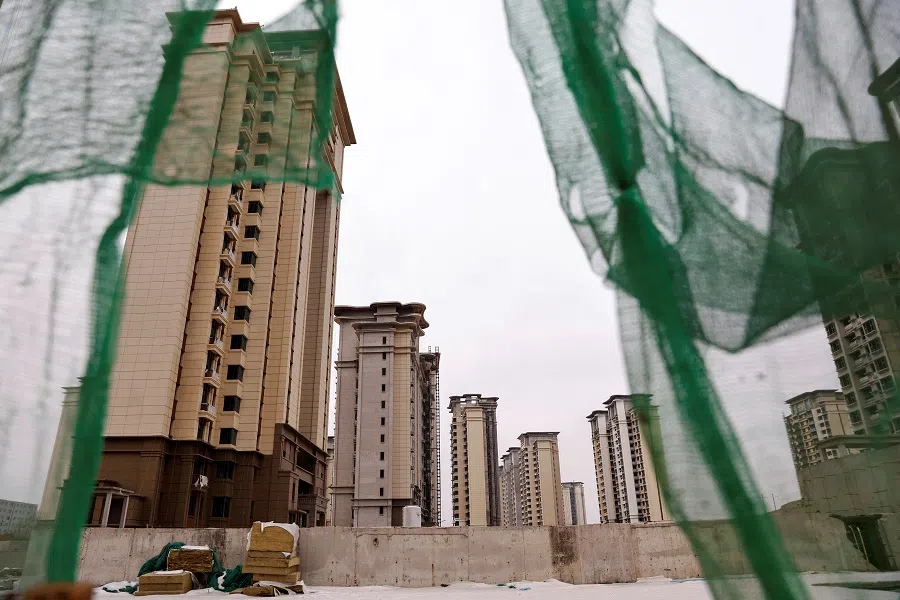 A view of unfinished residential buildings in the outskirts of Shijiazhuang, Hebei province, China, on 1 February 2024. (Tingshu Wang/Reuters)