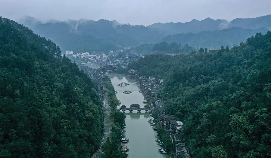 This aerial photo taken on 25 September 2020 shows the ancient town of Fenghuang in Xiangxi, in China's Hunan province. (STR/AFP)