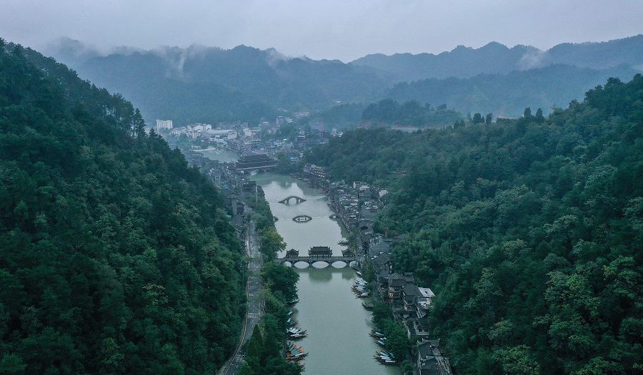 This aerial photo taken on 25 September 2020 shows the ancient town of Fenghuang in Xiangxi, in China's Hunan province. (STR/AFP)
