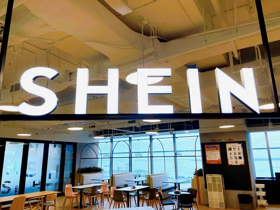 A Shein logo is pictured at the company's office in the central business district of Singapore, 18 October 2022. (Chen Lin/Reuters)