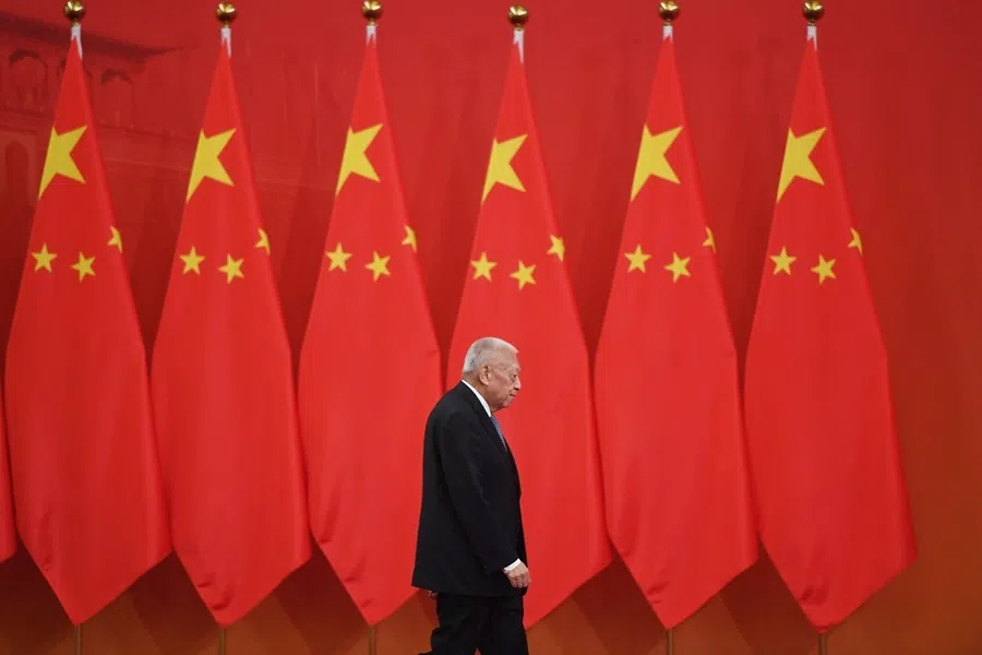 Former Hong Kong chief executive Tung Chee-hwa walks out to receive an award from Chinese President Xi Jinping at a ceremony in Beijing's Great Hall of the People on 29 September 2019.