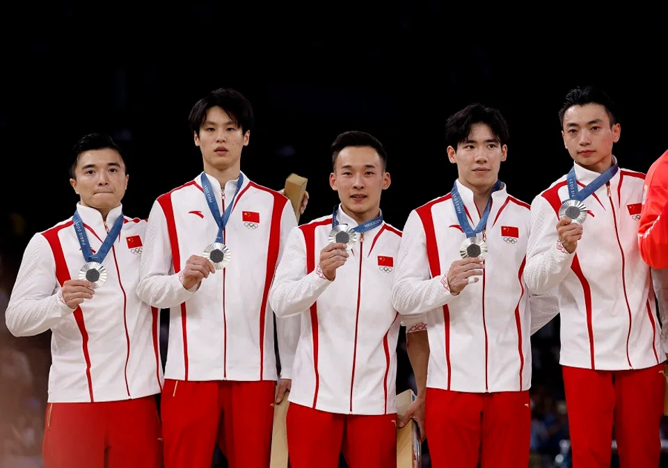 China wins men’s team silver in artistic gymnastics at the Paris Olympics, Bercy Arena, Paris, France, on 29 July 2024. (Amanda Perobelli/Reuters)