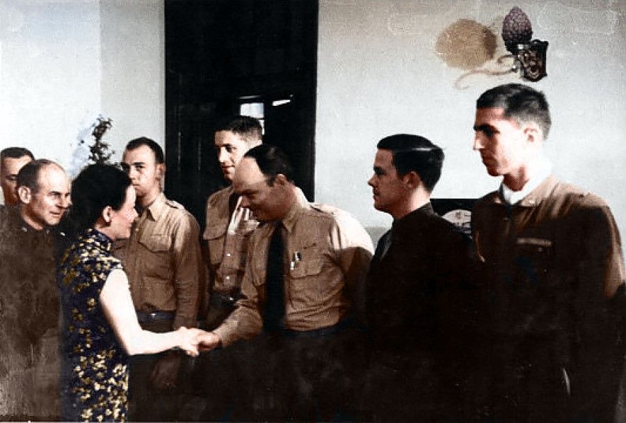 Lieutenant Colonel James Doolittle (left) introduced each pilot to Madame Chiang.